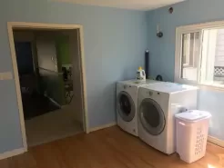 LAUNDRY/WET AREA WITH FULL SIZE WASHER AND DRYER