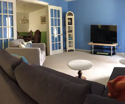 LARGE LIVING ROOM WITH 55-INCH TV